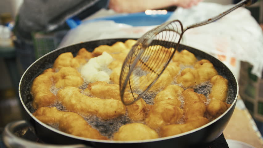 Frying Savory Zeppole In The Pan With Boiling Oil Calabria Typical Food