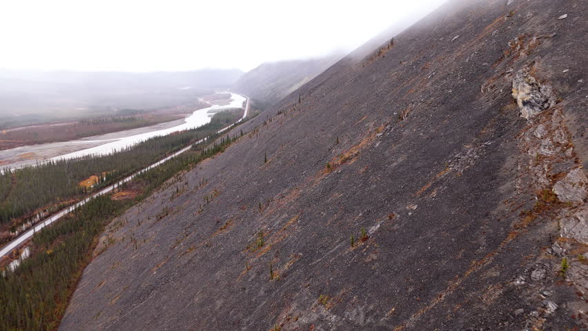 Steep Mountains Along Dempster Highway Near Engineer Creek In Yukon, Canada. Aerial Drone Shot