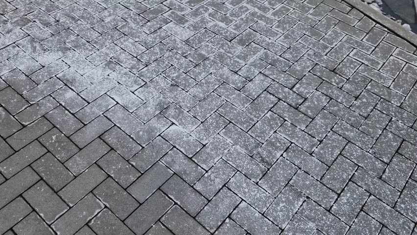 road salt, what is it that is sprinkled on roads, should I sprinkle it on paving around my house, will it not corrode paintsurface, sprinkled salt and in spring it all started, break off and chip,