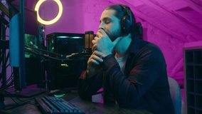 Frustrated pensive Caucasian influencer man thinking gamer talking upset addicted vlogger playing computer game guy streamer gaming decision cyber sport at home male contemplating blog blogger stream - Powered by Shutterstock - Get 15% off with code: PIKWIZARD15