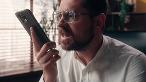 Annoyed Caucasian man boss corporate entrepreneur executive leader guy arguing angry adult businessman speak mobile phone in office manager male shouting quarrel with client business problem conflict - Powered by Shutterstock - Get 15% off with code: PIKWIZARD15