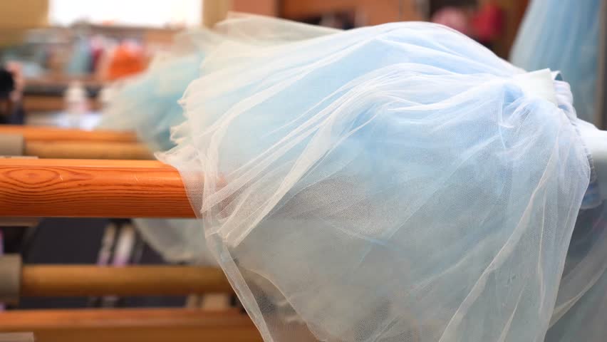 Ballet Blue Skirt For Girl Lying On The Barre In Ballet Class