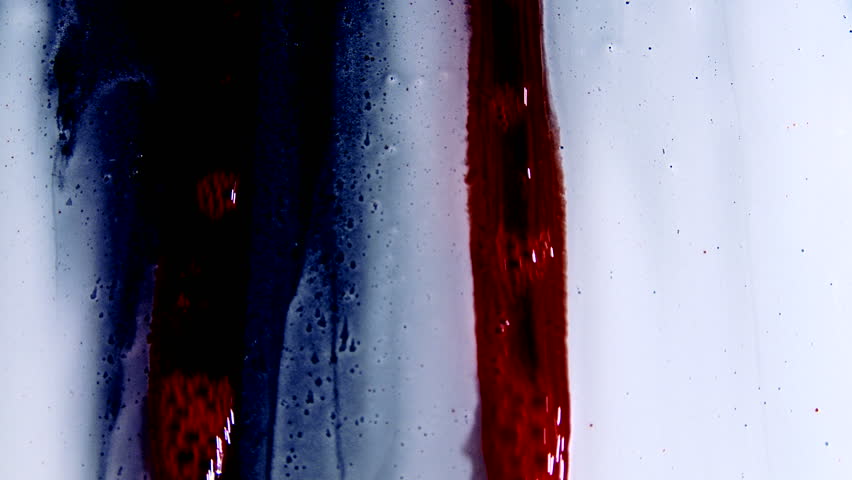 Washing away blood with pouring water on a soapy surface.