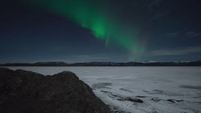 Aurora Borealis Over Frozen Lake Laberge In Yukon, Canada.Timelapse - Powered by Shutterstock - Get 15% off with code: PIKWIZARD15