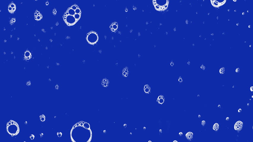 White foam and bubbles slide down in front of a blue background.
