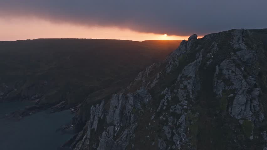 Mountainous Range in Poole, England. Aerial wide of stunning sunset backlit over craggy rocks