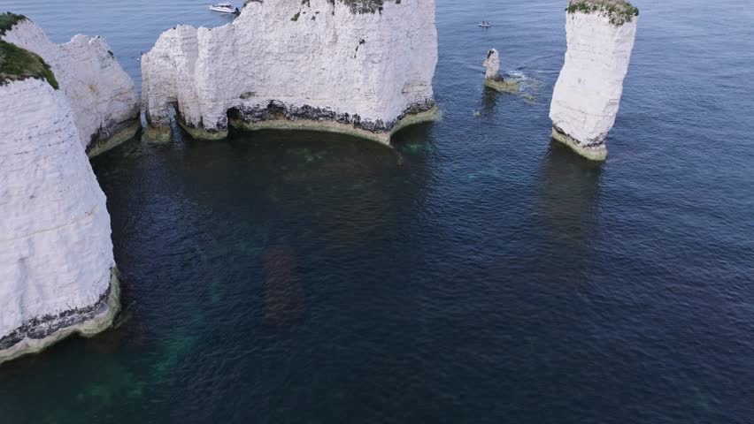 Old Harry Rocks Poole 60 degree pan shot aerial wide.