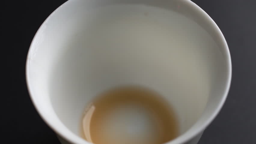Pouring Coffee Cream into a Cup creates an inviting moment full of delightful aromas and flavors. Media
