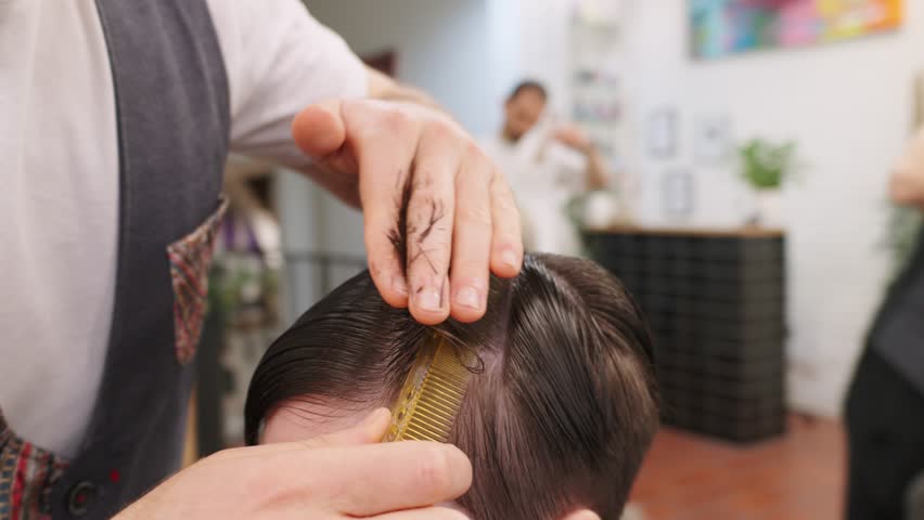 Barber cutting hair in slow motion step by step tutorial