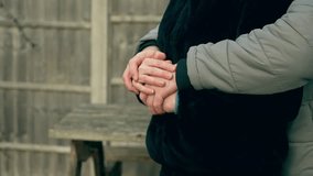 Hands gently intertwined, arms wrapping around in loving embrace. Special family occasions, celebrating joy, couple appreciating time together, husband and wife. Fingers clasping tightly, arms - Powered by Shutterstock - Get 15% off with code: PIKWIZARD15