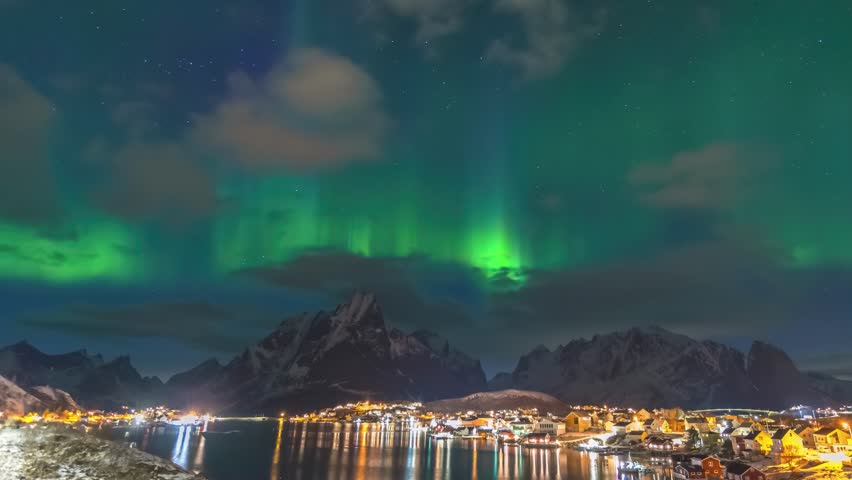 Lofoten Norway time lapse of the aurora borealis northern lights winter landscape at Reine fisherman village