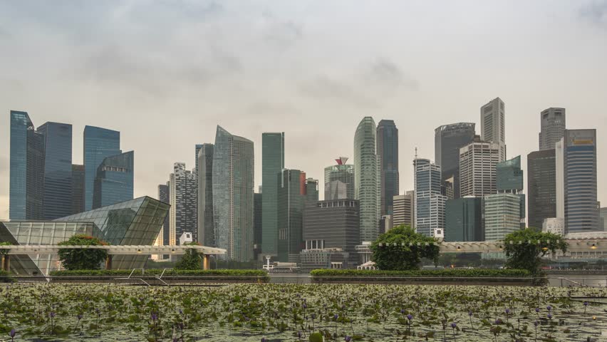 Singapore time lapse city skyline sunset at Marina Bay waterfront business district