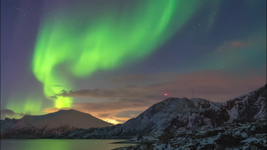 Tromso Norway time lapse of the aurora borealis northern lights winter landscape at Rorvikneset Sommaroy