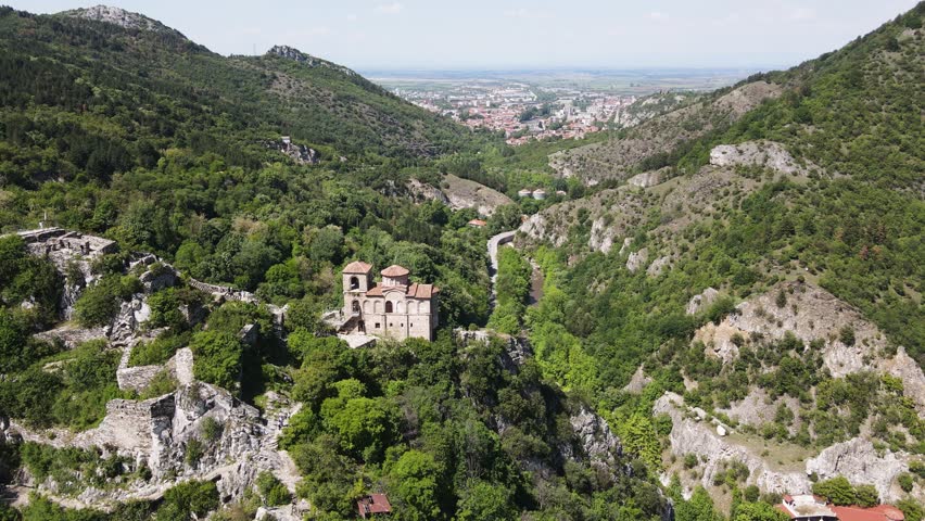 Aerial Spring view of Church of the Holy Mother of God at ruins of Medieval Asen Fortress, Asenovgrad, Plovdiv Region, Bulgaria