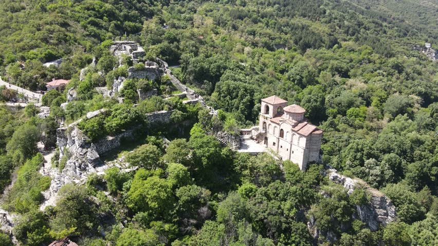 Aerial Spring view of Church of the Holy Mother of God at ruins of Medieval Asen Fortress, Asenovgrad, Plovdiv Region, Bulgaria