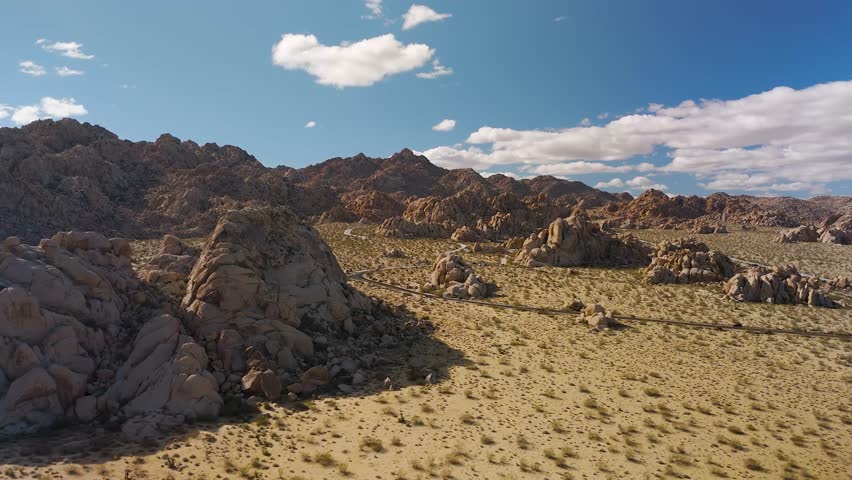Rock Formations At Joshua Tree National Park In Summer In California. - aerial shot