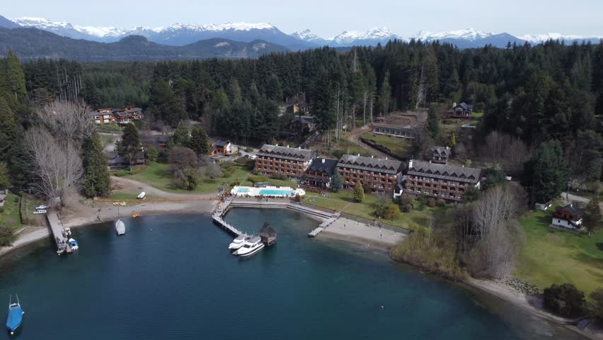 Aerial view of a drone on a sunny day over route 40, on the Seven Lakes Road between Bariloche and Villa La Angostura in Patagonia, Argentina.