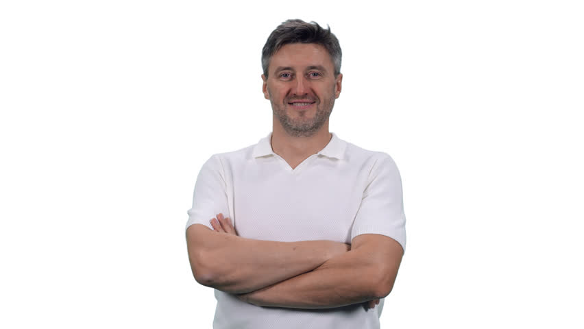 Smiling adult man in white t-shirt standing with arms crossed on chest, Full HD footage with alpha transparency channel isolated on white background