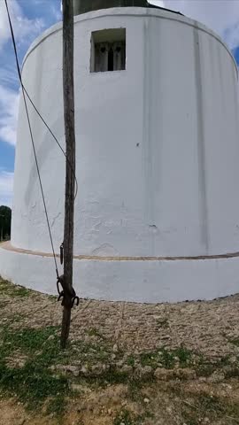Historic windmill architectural detail in the enchanting white village of Vejer de la Frontera, Cádiz, Andalusia, Spain.