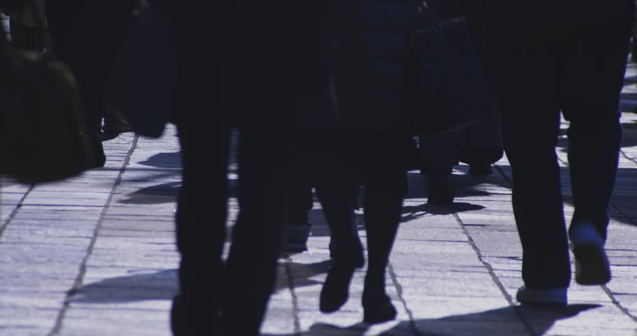 A slow motion of walking people at the city street in Tokyo