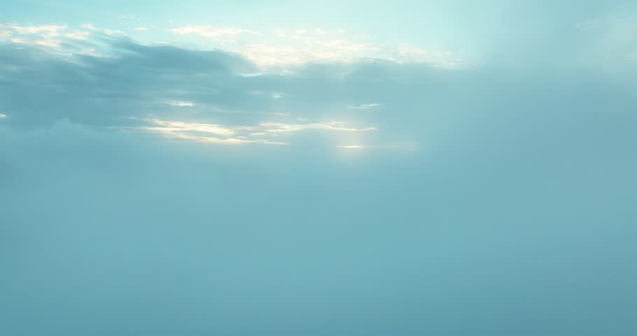 Camera is raising above from the thick fog above the beautiful ocean of clouds at sunrise. Paradise clouds slow motion at sunset. Amazing nature landscape drone in sky