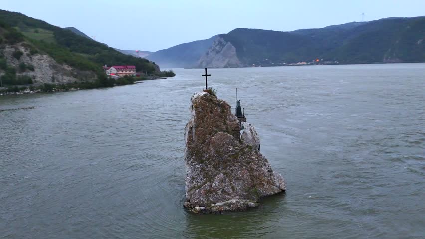 An ascending drone view over Cazanele Dunarii landscape, Moldova Veche, Romania