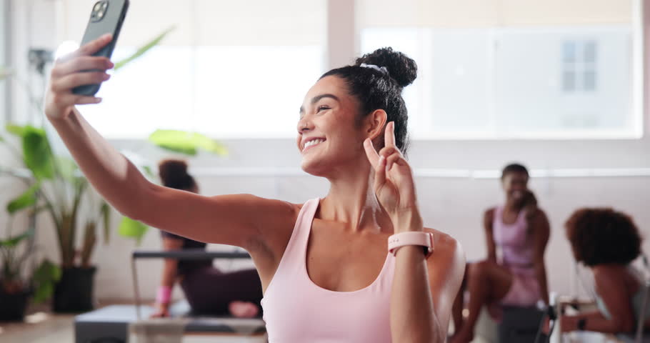 Happy woman, gym and peace sign with selfie for memory, picture or photography at health club. Female person, athlete or influencer with smile or emoji for capture moment, fitness or social media