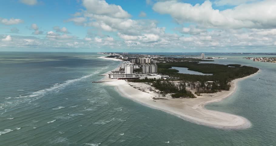 Lido Key, Sarasota, FL, USA - 02-20-2025: Winter aerial video of the vacation beach community, Lido Key, Sarasota, FL, on the Gulf of Mexico.