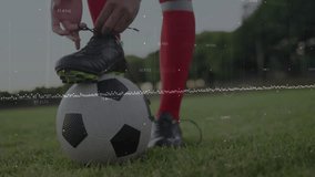 Soccer player tying shoe over digital data animation on grassy field. athlete, sports, technology, analytics, performance, fitness - Powered by Shutterstock - Get 15% off with code: PIKWIZARD15