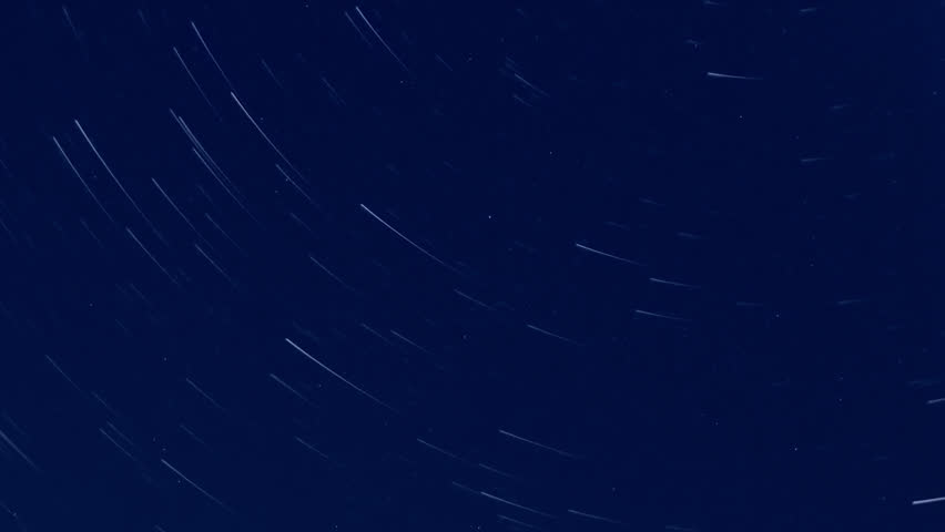 Night starry sky, milky way in night horizon, beautiful dark day time, stars shining, white. Star trails rolling. Nice clear weather.