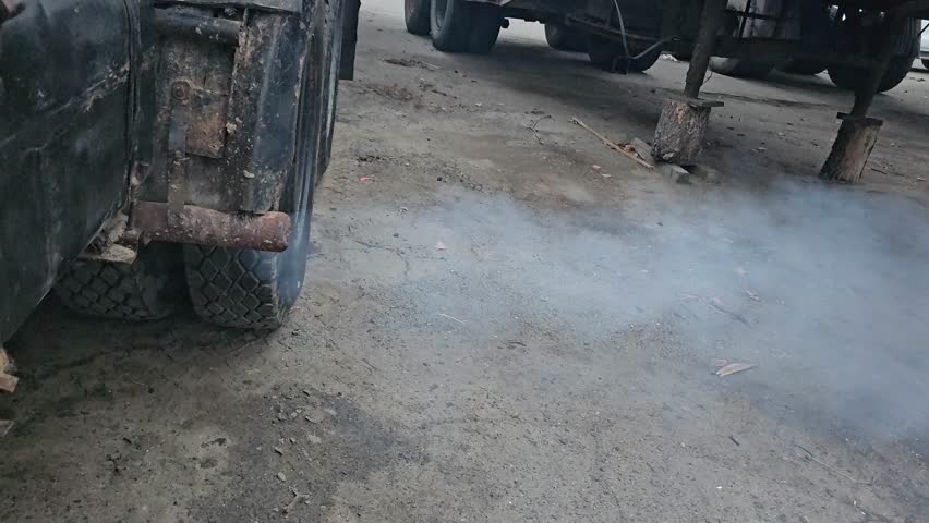 combustion products from the exhaust pipe of a large vehicle - smog, pollution