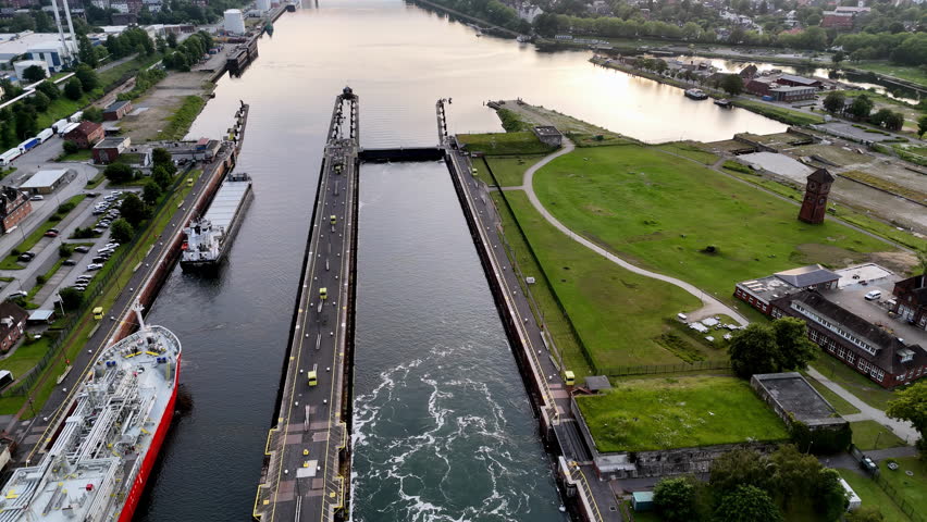 Aerial Summer View of Kreekraksluis Lock Complex, Sunny Day with Scattered Clouds, Vibrant Greens and Blues, High-Angle Drone Photography, Wide-Angle Lens, Industrial Landscape