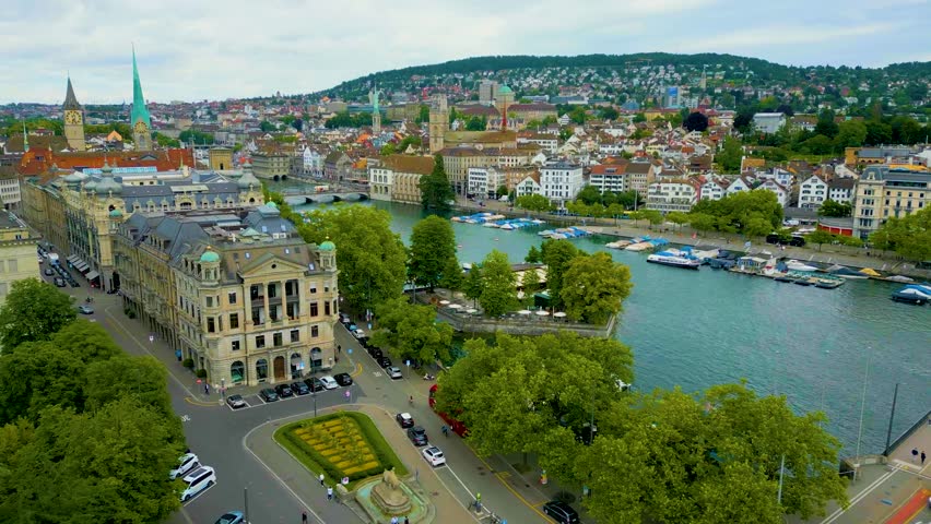 4K Drone Video of Traffic on the Quaibrücke Bridge over the Limmat River in Downtown Zurich, Switzerland (High Speed)