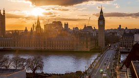 Elevated sunset to night time lapse view of the Westminster Palace and Big Ben clocktower in London with street and people traffic, England - Powered by Shutterstock - Get 15% off with code: PIKWIZARD15