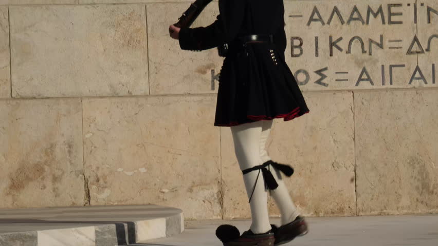 Athens, Greece Evzones 04.02.2025 Greek Presidential Guard in national clothes uniform at the tomb of unknown soldier in Athens, Greece. Ceremonial ritual changing guards, aerial shot