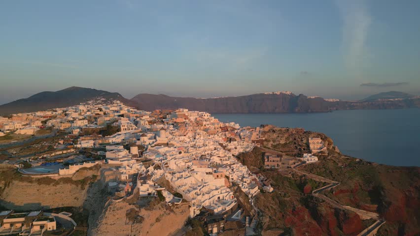 Stunning Sunset Over Oia, Santorini – Aerial Drone Footage