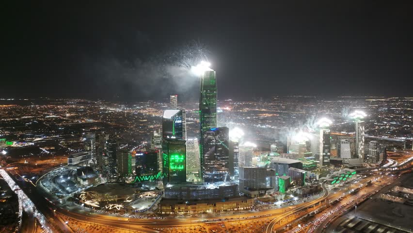 Aerial view of KAFD celebrating Saudi Founding Day with fireworks at night in Riyadh, Saudi Arabia