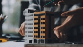 Construction and structure of Engineer or architect meeting for project working with partner and tools on model building and blueprint in working site - Powered by Shutterstock - Get 15% off with code: PIKWIZARD15