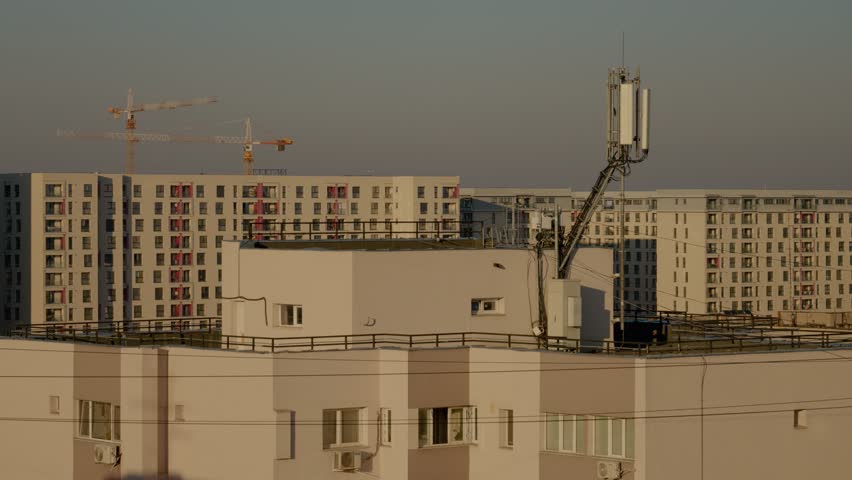 Explore the stunning urban landscape of Bucharest with a focus on rooftop buildings amid construction and residential areas, highlighting the city