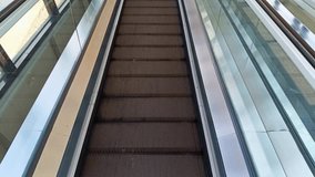 Abstract Geometric Pattern On Modern Escalator System Interior Design Element With Brown And White Accents and Repeating Geometric Shapes And Lines - Powered by Shutterstock - Get 15% off with code: PIKWIZARD15