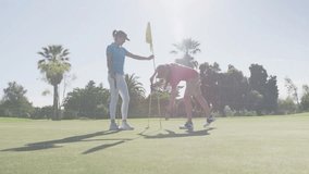 Two golfers shaking hands on course with financial data animation overlay. handshake, business, finance, collaboration, partnership - Powered by Shutterstock - Get 15% off with code: PIKWIZARD15