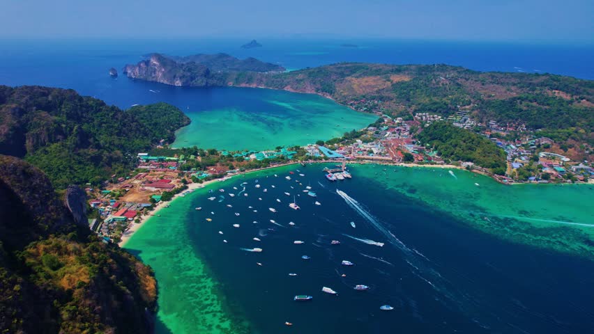 Aerial view sunset Phi Phi island in Andaman Sea from drone in Province of Krabi, travel landmark of Thailand.