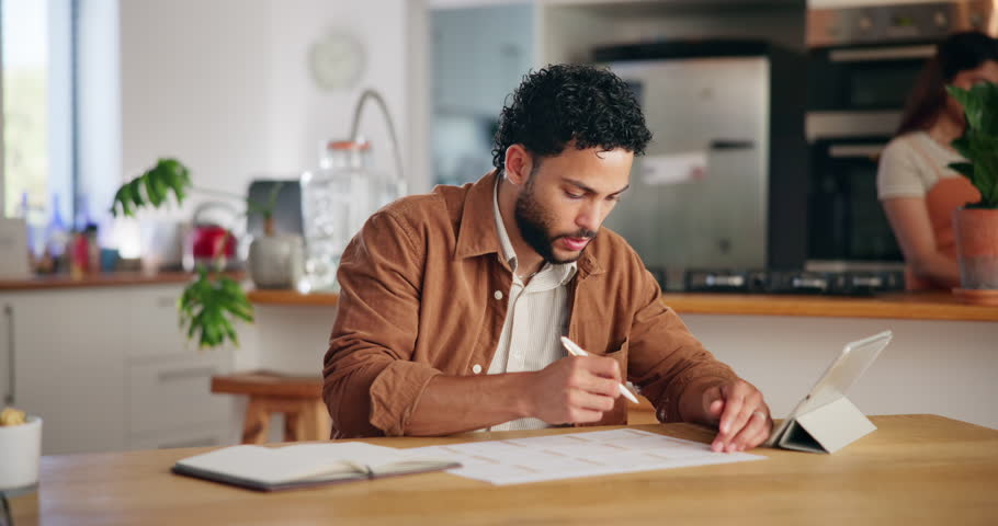 Man, notes and tablet with calendar at house for planning schedule, tasks reminder and appointment. Male person, digital and writing for date of annual agenda, time management and publishing deadline