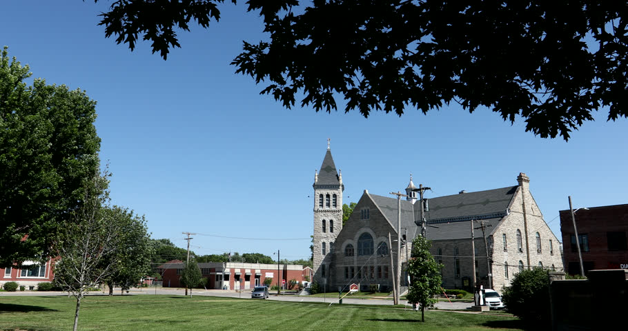 Afternoon sun shines on the historic 19th Century public Franklin County Courthouse in downtown Ottawa, Kansas, USA.