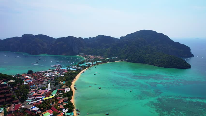 Aerial view sunset Phi Phi island in Sea, Province of Krabi, travel landmark of Thailand from drone.