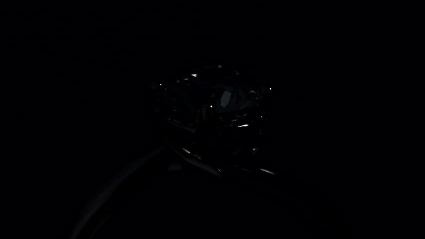 beautiful bright and shine diamond ring blinking on black background