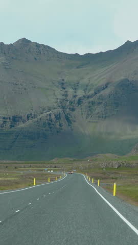 Car driving on the road to Iceland. Inside view of a car. Road number 1 is Iceland