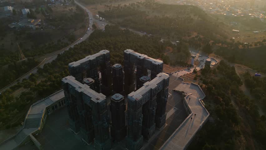 Drone View of the Chronicle of Georgia Monument at Sunset