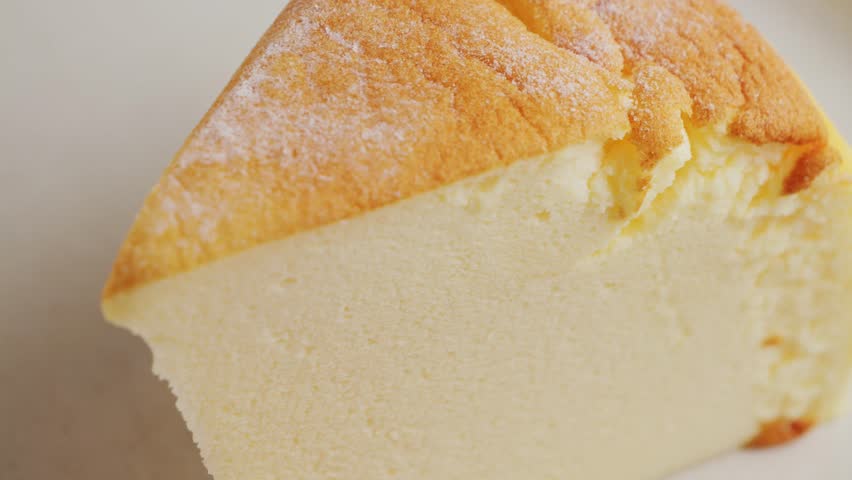 Close up of Japanese fluffy cotton cheesecake on plate. High quality 4k footage