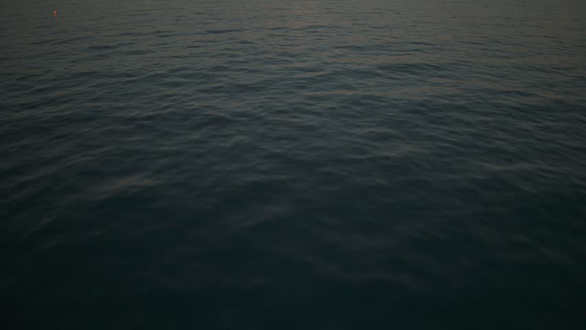 Drone shot reveal of a ferris wheel in golden hour in Marseille
Drone starting low above the water and tilt up to discover a Ferris Wheel during golden hour in Marseil